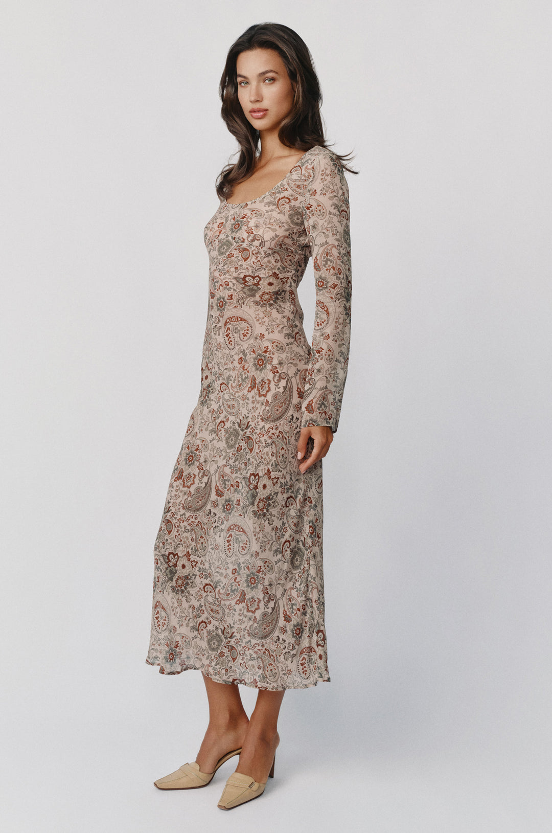 Josephine long-sleeve midi dress in stone paisley print with a scoop neckline and sheer finish.