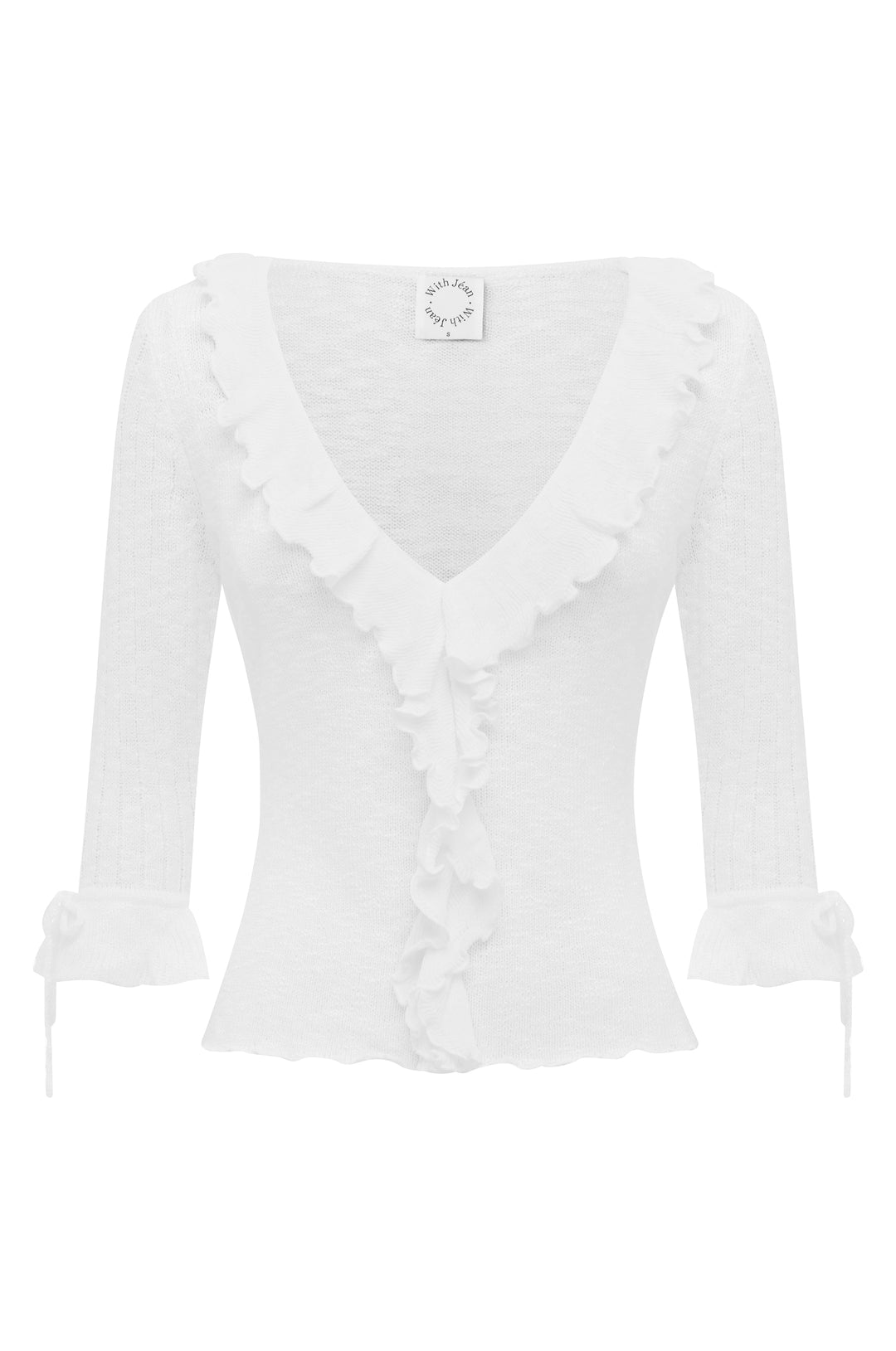 White knitted Bianca top with 3/4 sleeves, ruffle-trim V-neckline, and tie-detail ruffle cuffs.