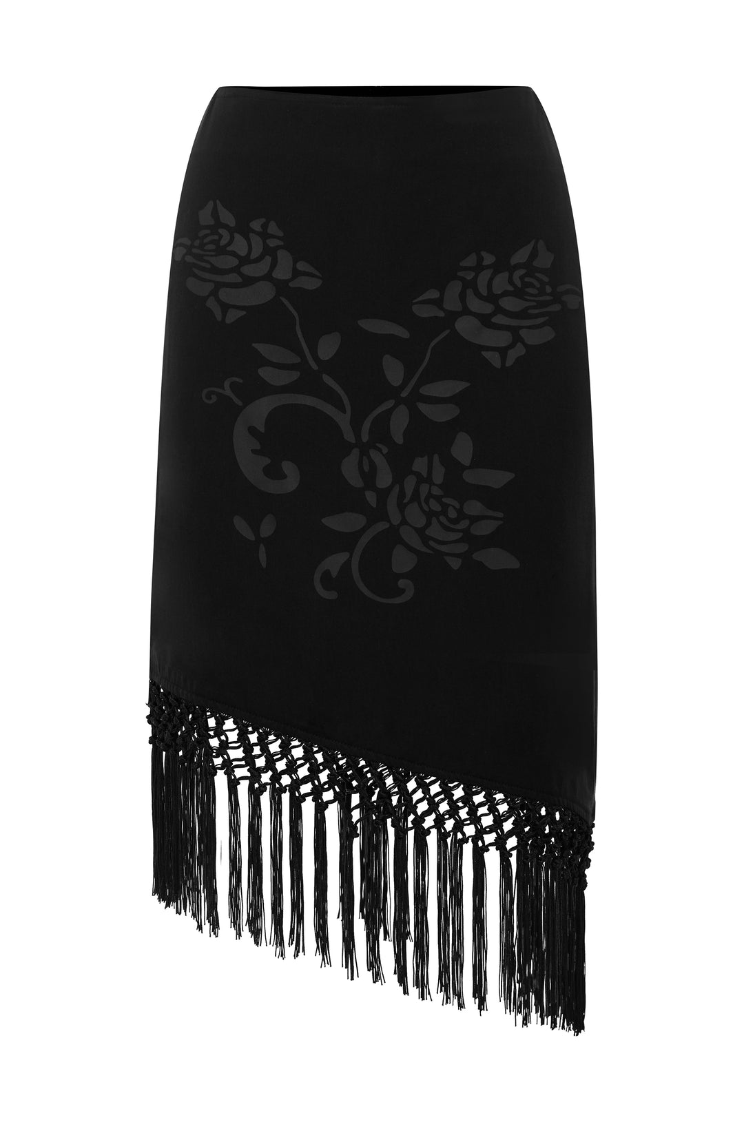 Black low-rise skirt featuring a tonal floral print, asymmetrical hem, and decorative macrame fringe trim.
