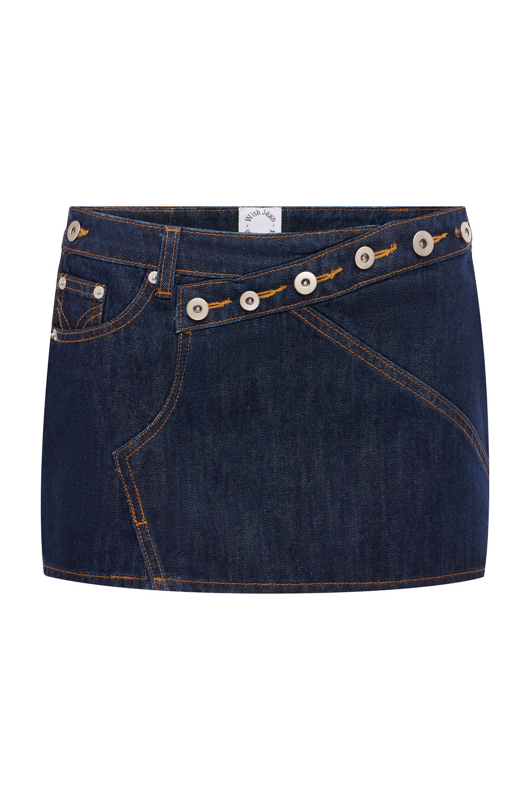 Low-rise indigo blue denim mini skirt with asymmetric panel construction, silver button detailing, and contrast stitching.