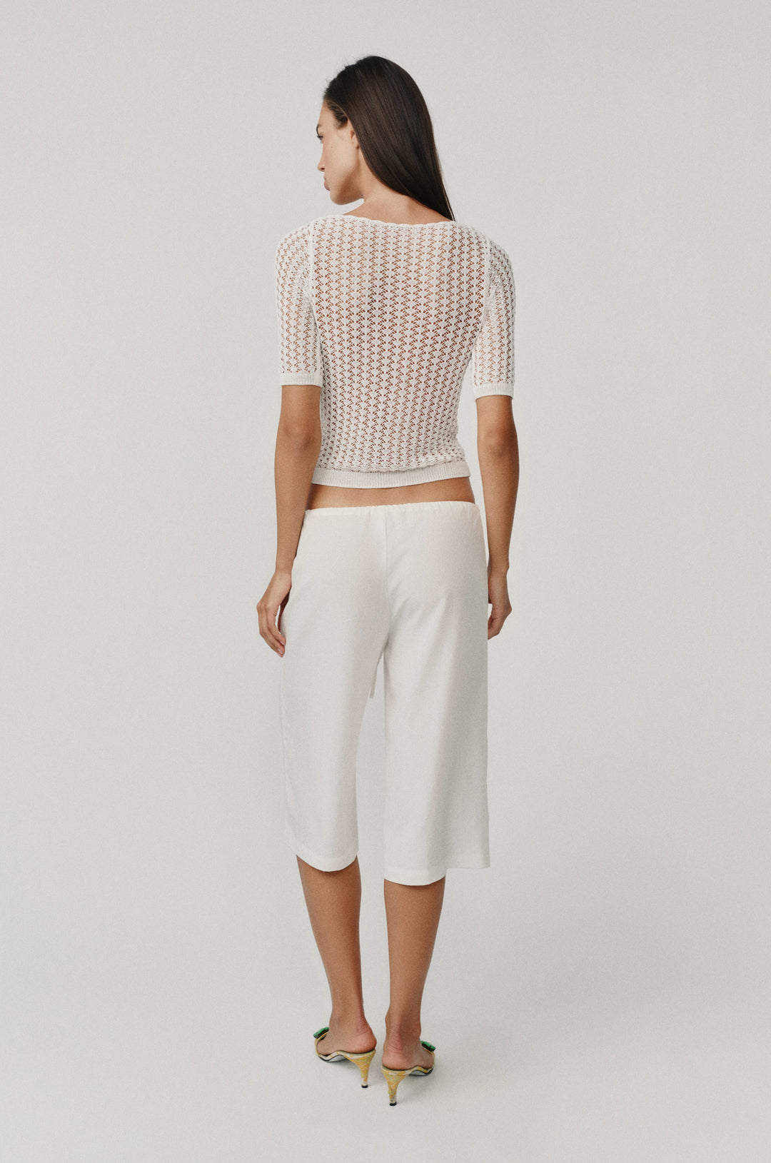 White knitted Harper Top with scoop neckline, half sleeves, and contrast rib detailing.