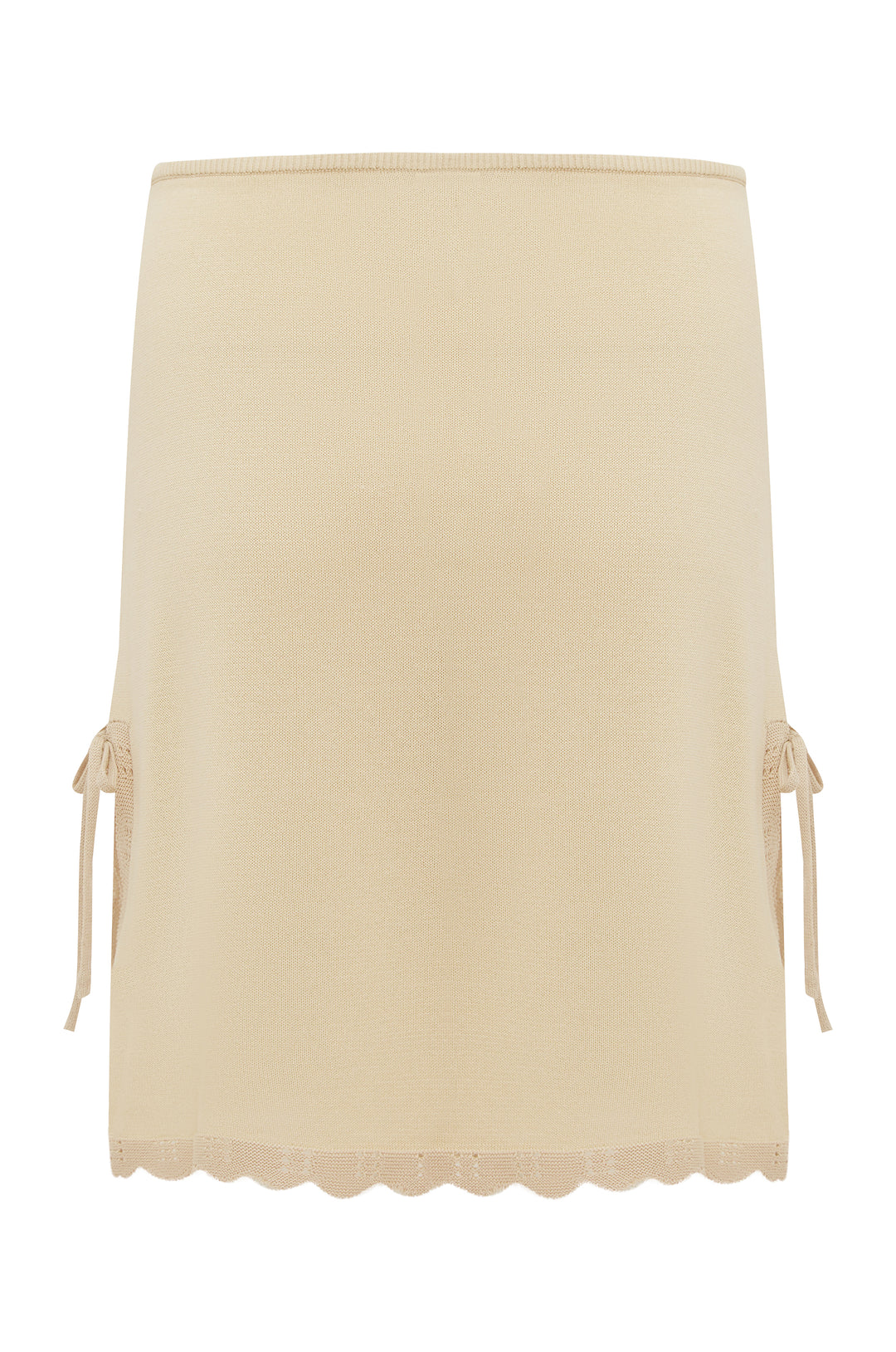 Beige low-rise Isla skirt featuring a scalloped contrast hem and side slits with adjustable self-tie closures.