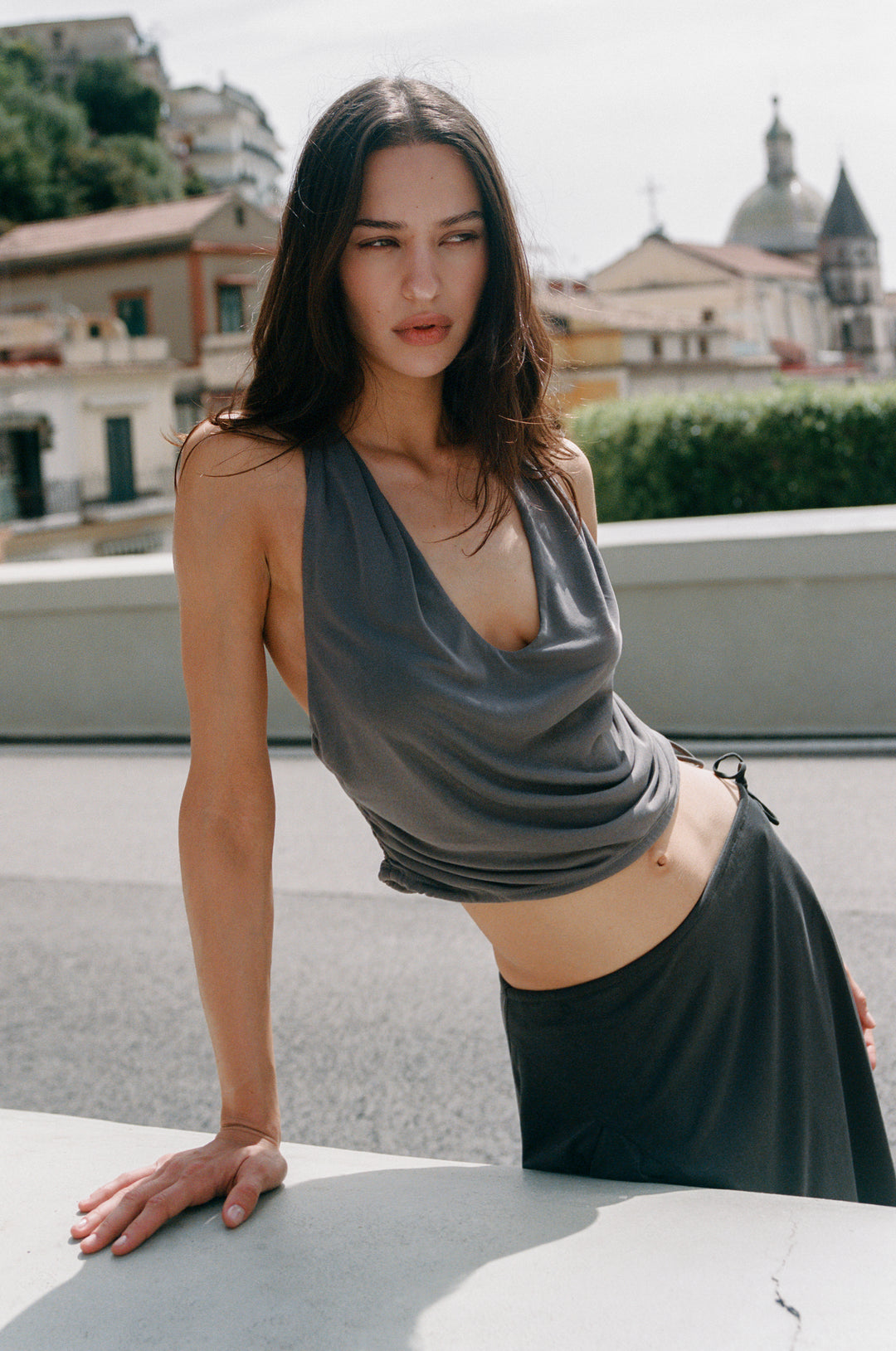 Jolene Top in Slate: halter-style top with ruched sides, adjustable tie, and low back.