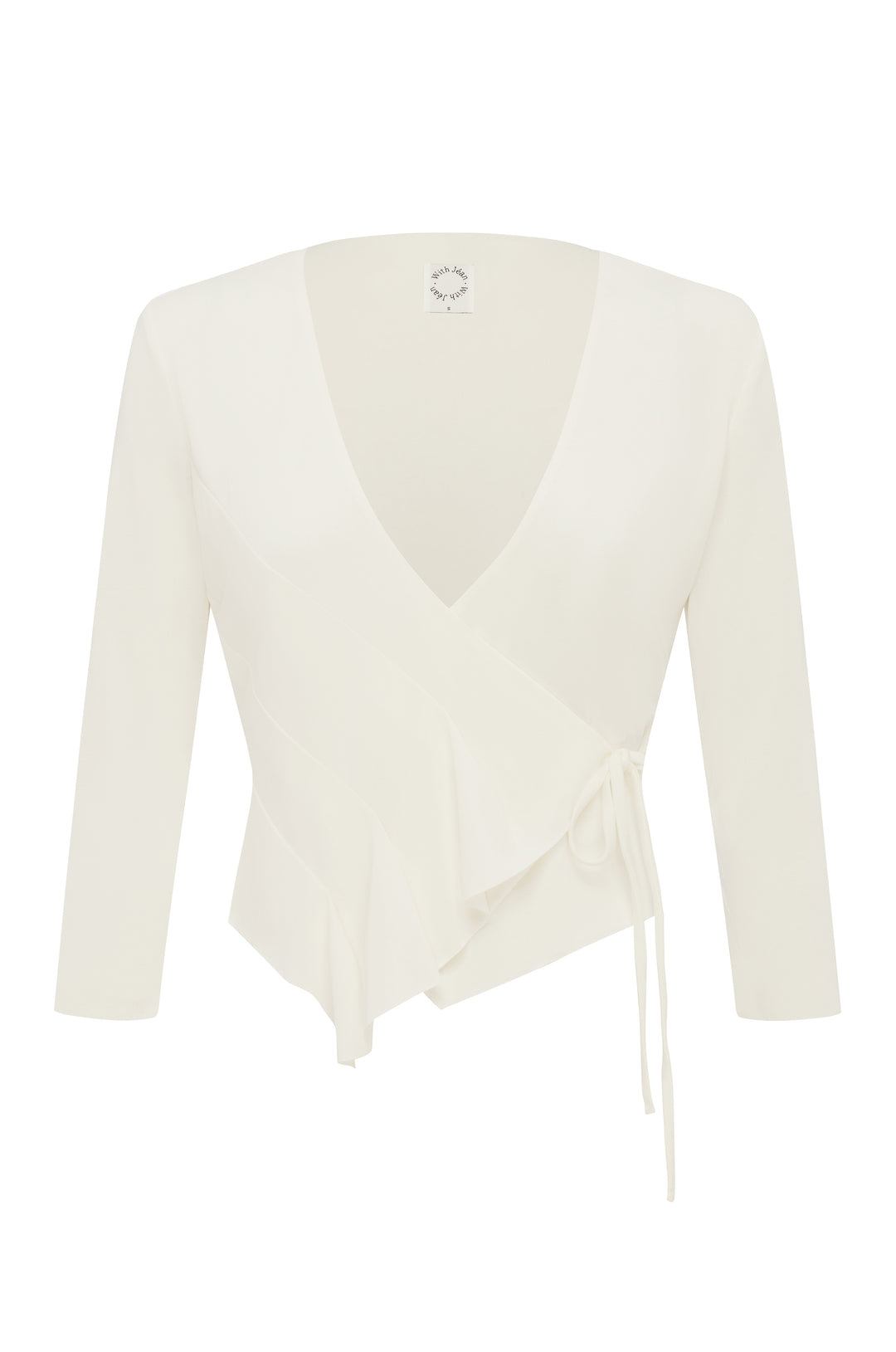 Off-white Nelly wrap top with 3/4 sleeves, V-neck, ruffle, and asymmetrical hem.
