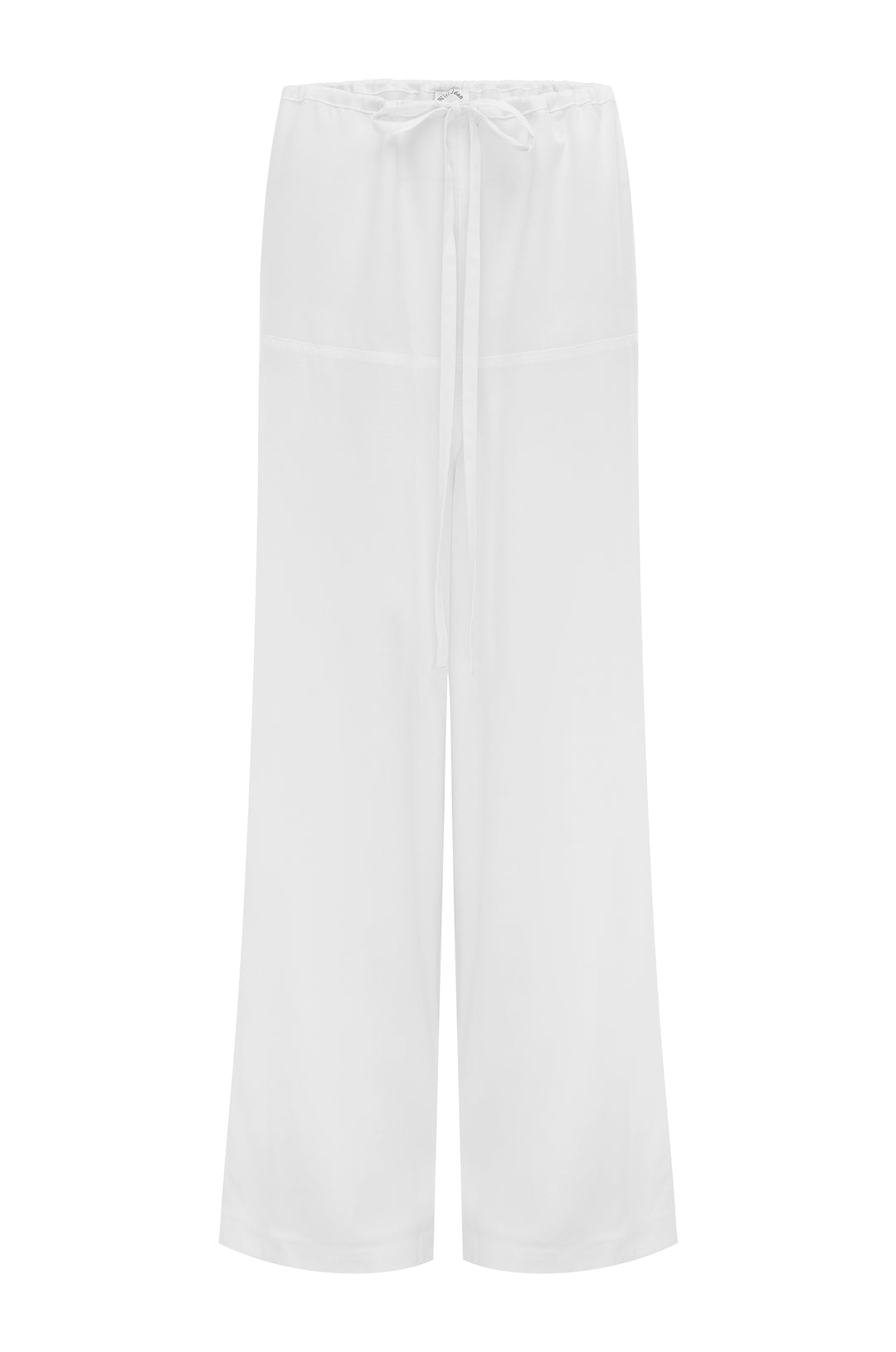 White loose-fit Norah pants with a high elastic waistband and adjustable self-fabric tie closure.