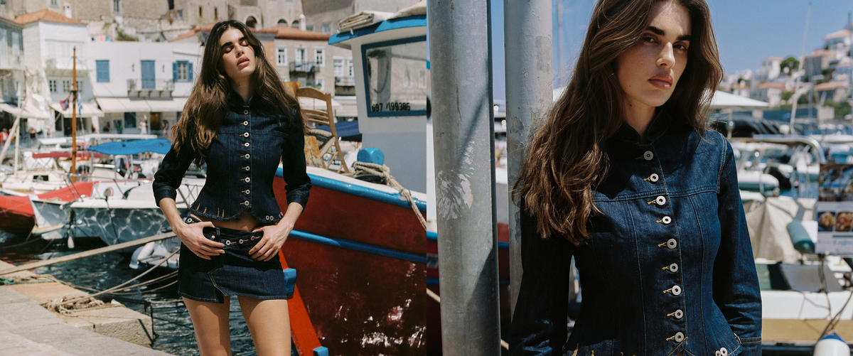 A split-screen lifestyle image of a model wearing a dark denim button-up shirt dress in a sunny coastal harbor setting with boats and white buildings.