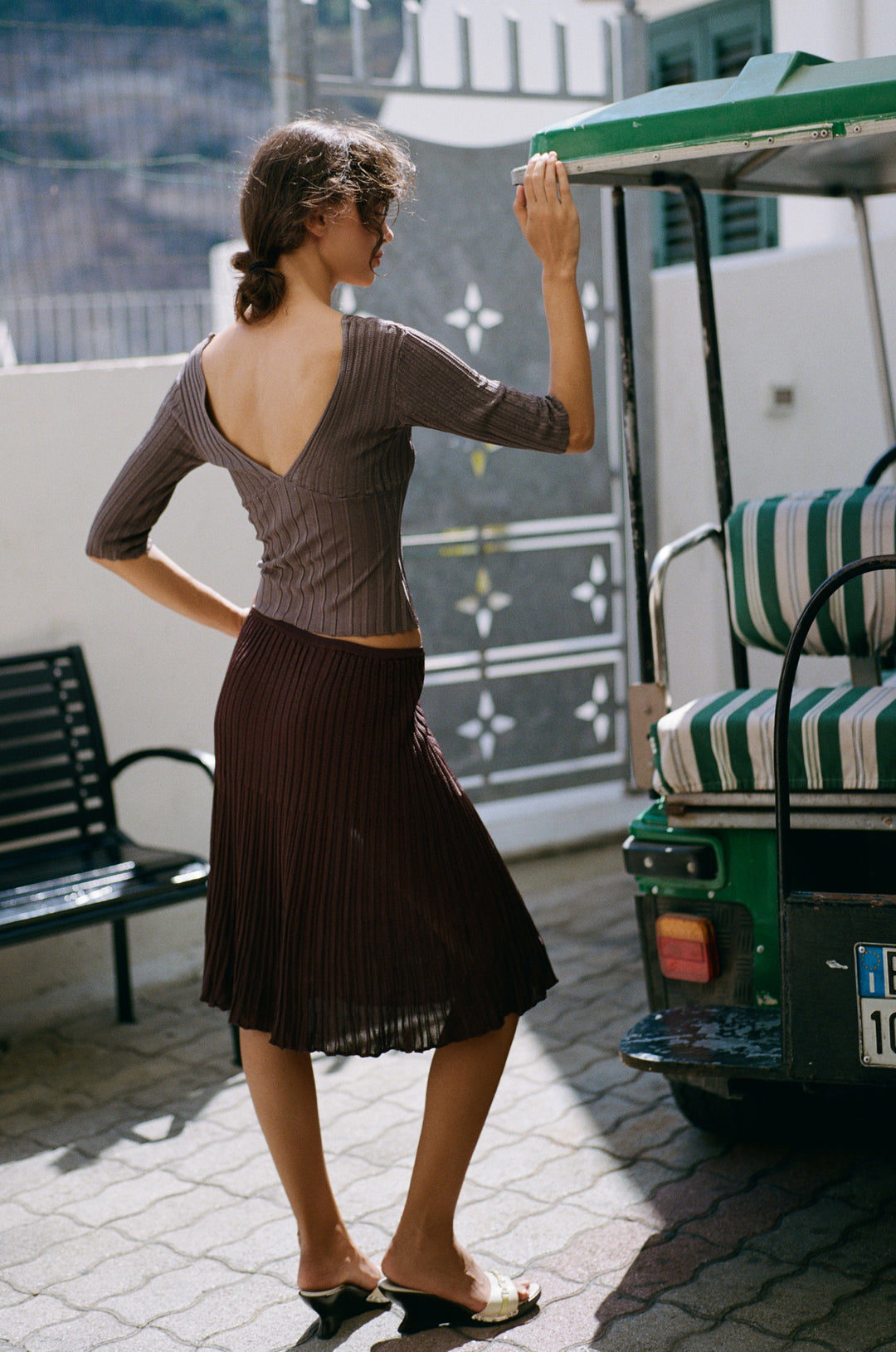 Chocolate brown ribbed-knit midi skirt with an elasticated waistband and contrasting rib detailing.
